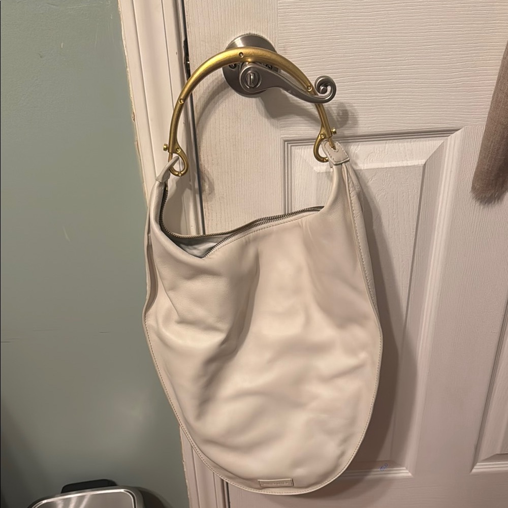 luna frame handle hobo bag